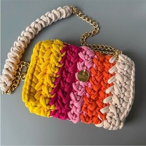 Macrame purse in a cream/yellow/pink color